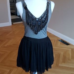 Dress with distressed skirt